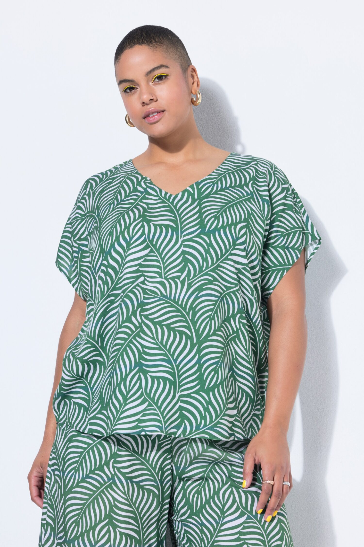 Μπλούζα oversized με στρογγυλεμένο τελείωμα