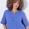 Μπλούζα oversized σε γραμμή Α με πιέτες και κοντά μανίκια