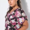 Μπλούζα oversized με φλοράλ μοτίβο και στρογγυλεμένο τελείωμα