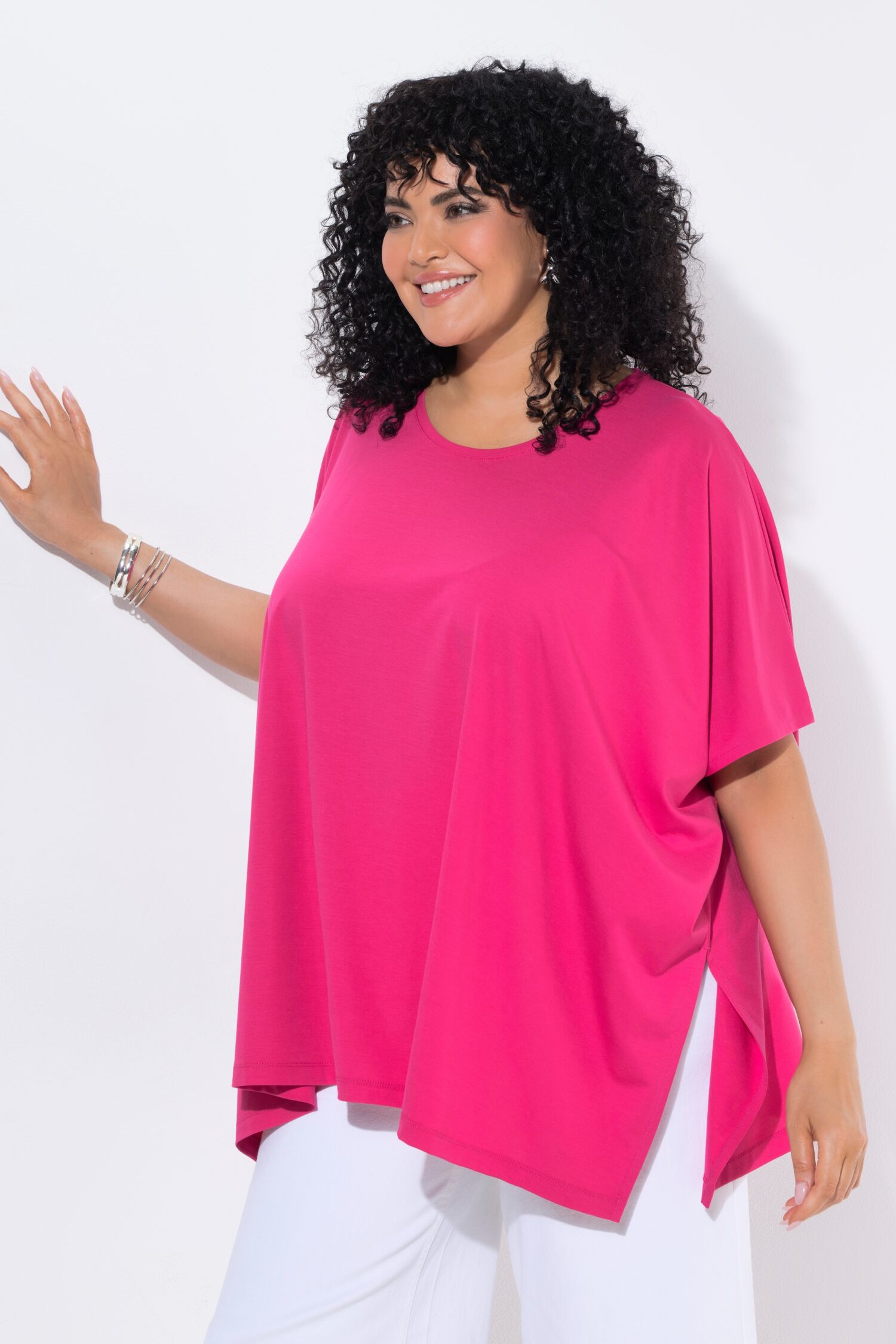 Μπλούζα oversized με στρογγυλή λαιμόκοψη και μυτερό τελείωμα