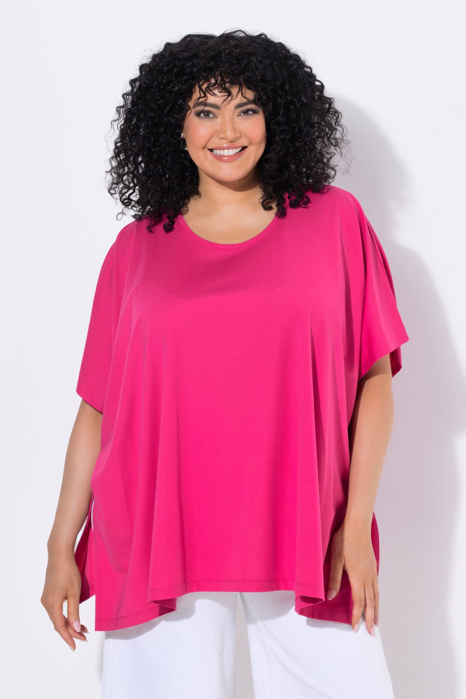 Μπλούζα oversized με στρογγυλή λαιμόκοψη και μυτερό τελείωμα