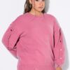 Πουλόβερ oversized με μεταλλικές καρδιές στα μανίκια