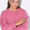 Πουλόβερ oversized με μεταλλικές καρδιές στα μανίκια