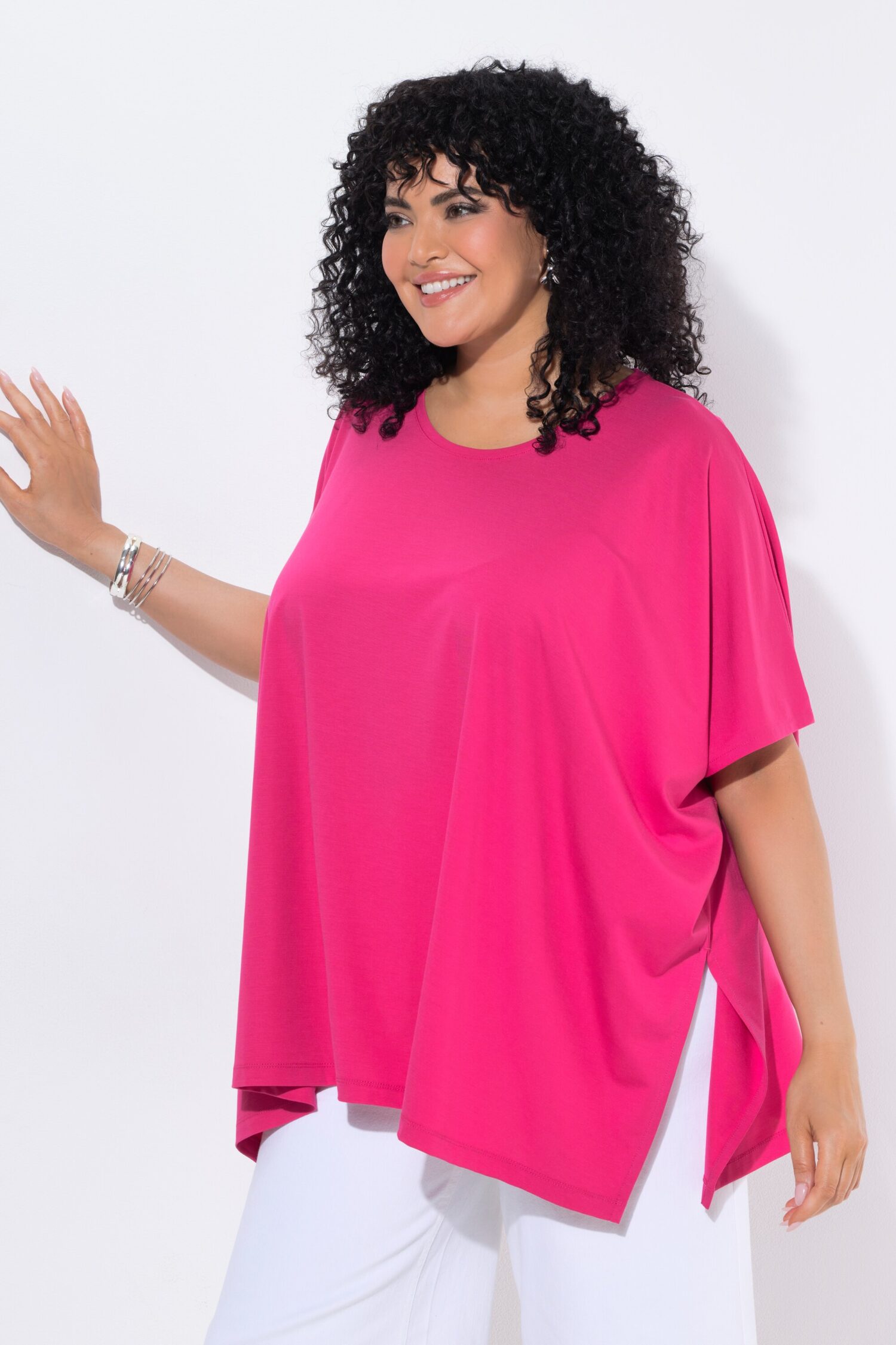 Μπλούζα oversized με στρογγυλή λαιμόκοψη και μυτερό τελείωμα